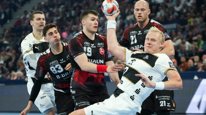 THW Kiel - MT Melsungen Kiels Patrick Wiencek (vorne) kommt zum Wurf.